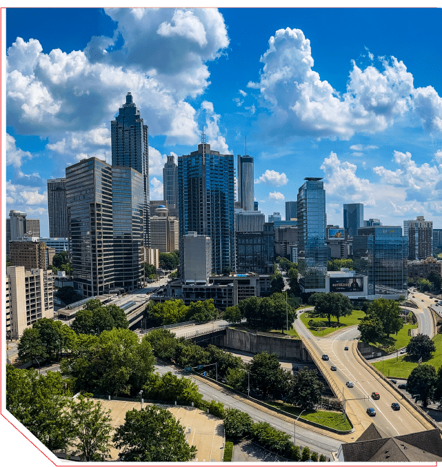 a view of a city with tall buildings in the background