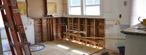 Residential reconstruction services are underway in a homeowner’s kitchen after experiencing water damage.