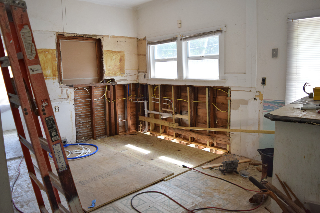 Residential reconstruction services are underway in a homeowner’s kitchen after experiencing water damage.